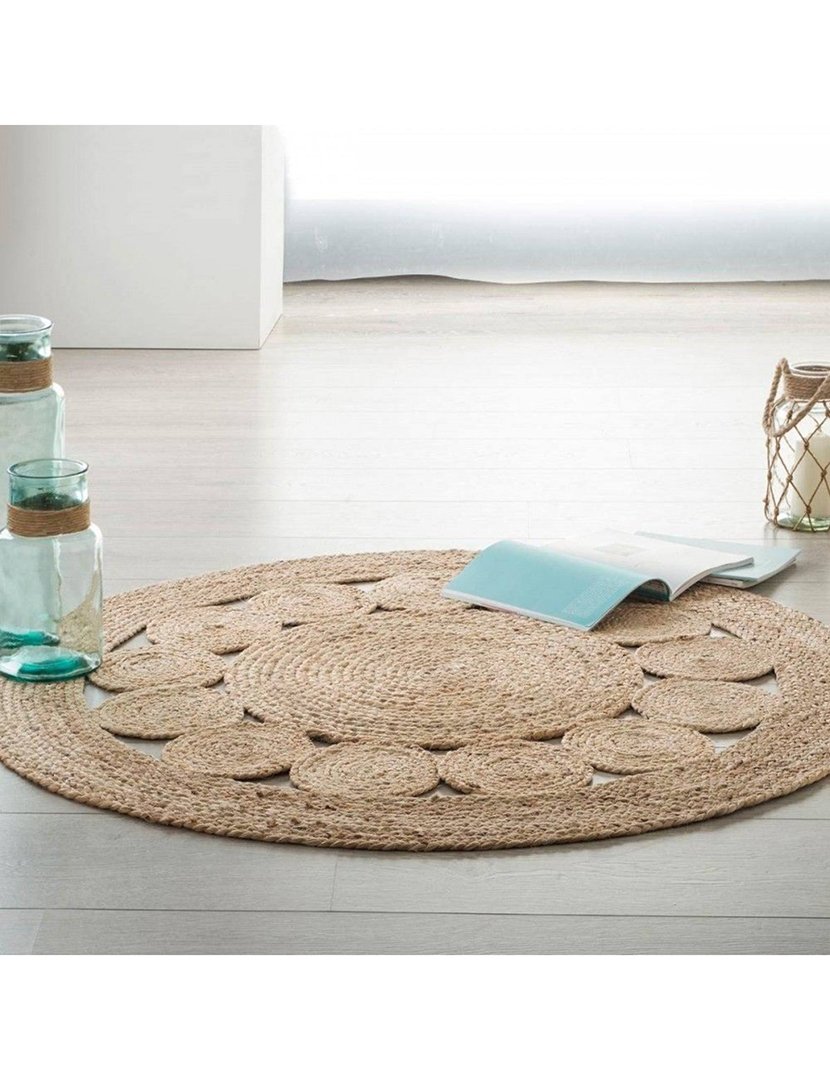 Tapete redondo rústico com desenhos geométricos