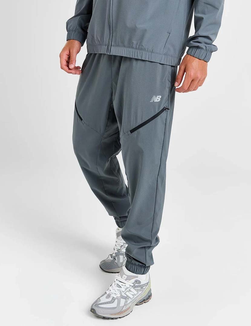 Calças desportivas NB Woven Zip Pocket Cinzento