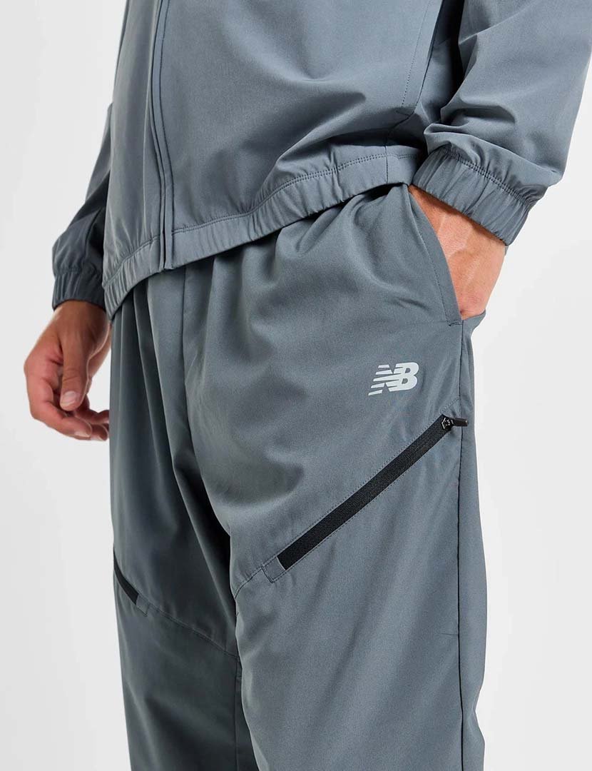 Calças desportivas NB Woven Zip Pocket Cinzento