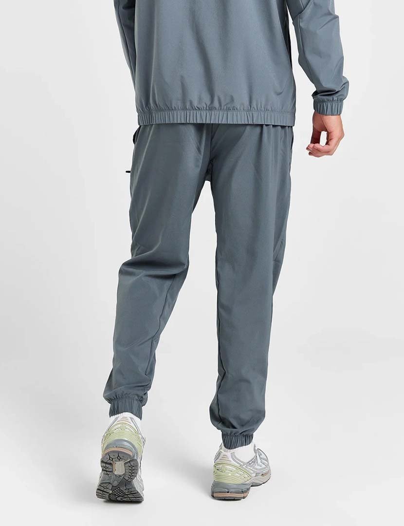 Calças desportivas NB Woven Zip Pocket Cinzento